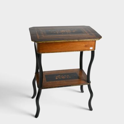 a small table with a wooden top and black legs