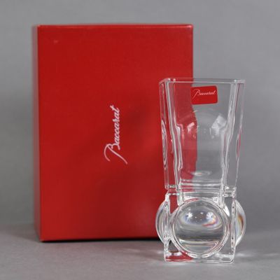 a red box with a glass on it and a red box with a glass on it