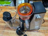 a blender that is sitting on a wooden table