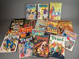 a lot of comic books that are on the table