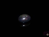 an image of a black and white object in the dark