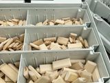 a box full of wooden blocks sitting on a table