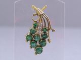 an image of a close up of a pair of earrings on a clear stand