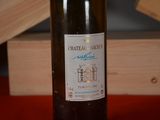 a bottle of wine that is sitting on a table