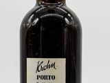a bottle of wine that is sitting on a table