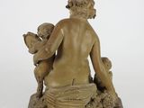an image of a statue of a woman holding a child