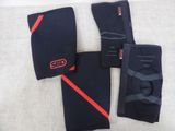 a close up of a pair of knee pads on a white surface