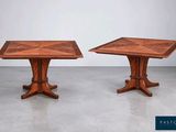 a pair of tables with a wooden top and a wooden base