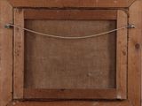 an old wooden picture frame with a rope hanging from it ' s side