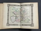 an open book with a map of france on it