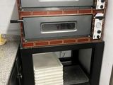 an image of a stack of pizza ovens in a kitchen