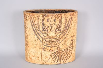 a vase with a picture of a man and a woman on it