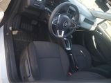 a picture of a car with a steering wheel and dashboard