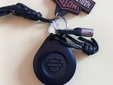 a keychain with a harley davidson badge on it