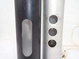 two black and silver vases sitting next to each other
