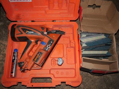 a box with a stapler and a stapler in it
