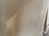 a close up of a piece of fabric with a white background
