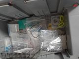 a small refrigerator with a lot of items inside of it
