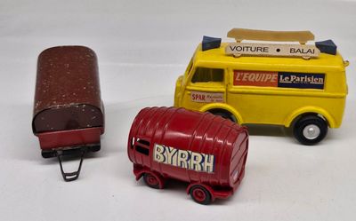 three toy vehicles that are sitting next to each other