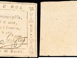 un vieux papier sur lequel figure la photo d'un homme d'un côté et celle d'un autre homme de l'autre côté