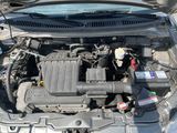 the engine of a car with its hood open and the hood open