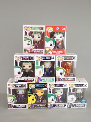 a lot of different pop vinyl figures in the box