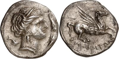 a silver coin with an image of a horse on it