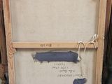 a picture of a painting on the floor in front of a window