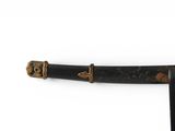 a black and gold sword on a white background
