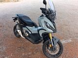 a motorcycle that is parked on the side of the road