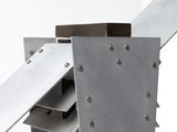 a close up of a metal structure with rivets and rivets on it