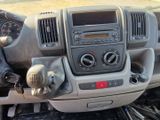 a dashboard of a truck with various gauges and controls