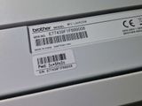 a label on the back of a printer that says brother
