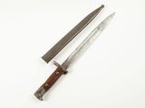 two knives are laying side by side on a white surface