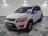 the white ford kuga is parked on a checkered tile floor