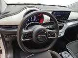 the interior of a car with a steering wheel, dashboard, and dash board