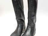 pair of black leather boots on a white background
