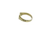 a close up of a gold ring on a white background