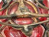 a close up of a sculpture of a face made out of glass