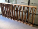 an image of a wooden railing in a room