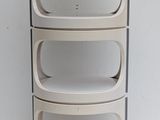 three shelves that are stacked on top of each other