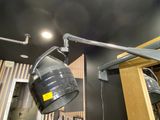 a light that is hanging from the ceiling in a room