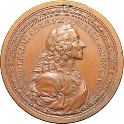 une image représentant une médaille de bronze sur laquelle figure un homme aux cheveux longs et à la barbe
