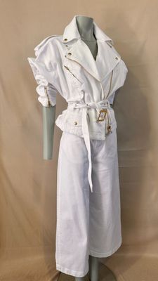 a mannequin with a white coat and white pants