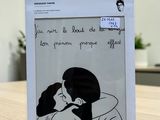 the packaging of a box with a drawing of a man kissing a woman