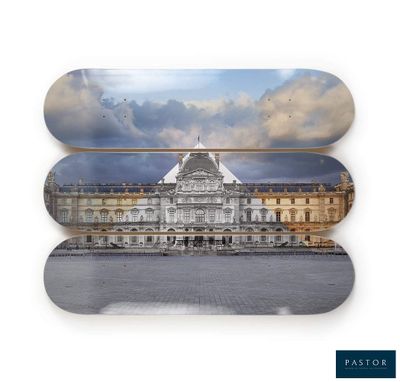 a skateboard that has a picture of a building on it