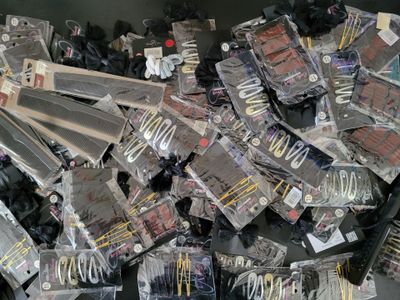 many different types of electronic gadgets in a bin