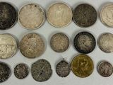 a lot of coins that are sitting on a table