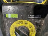 a close up of a machine with a yellow button