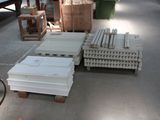 a lot of boxes and pallets on the ground